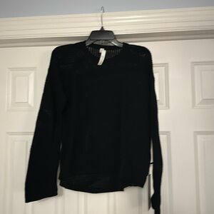 Black Lululemon easy embrace LS sweater size M/L. Brand-new with tags.